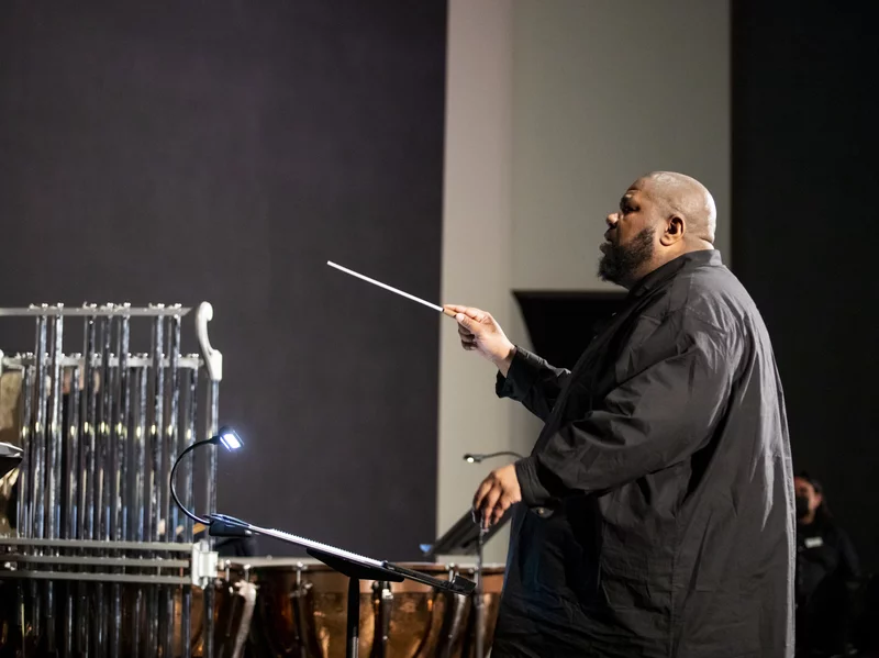 Composer, conductor and multi-instrumentalist Tyshawn Sorey leads a rehearsal of his Monochromatic Light (Afterlife) at the Rothko Chapel in Houston on Feb. 18. Scott Dalton/DACAMERA