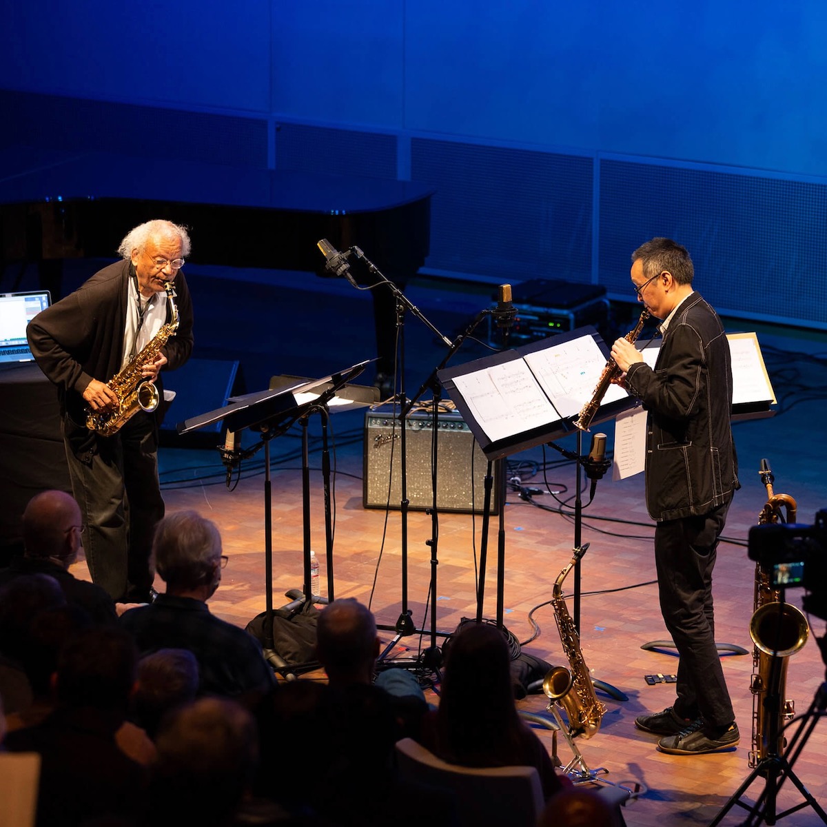 Anthony Braxton and James Fei playing saxophones