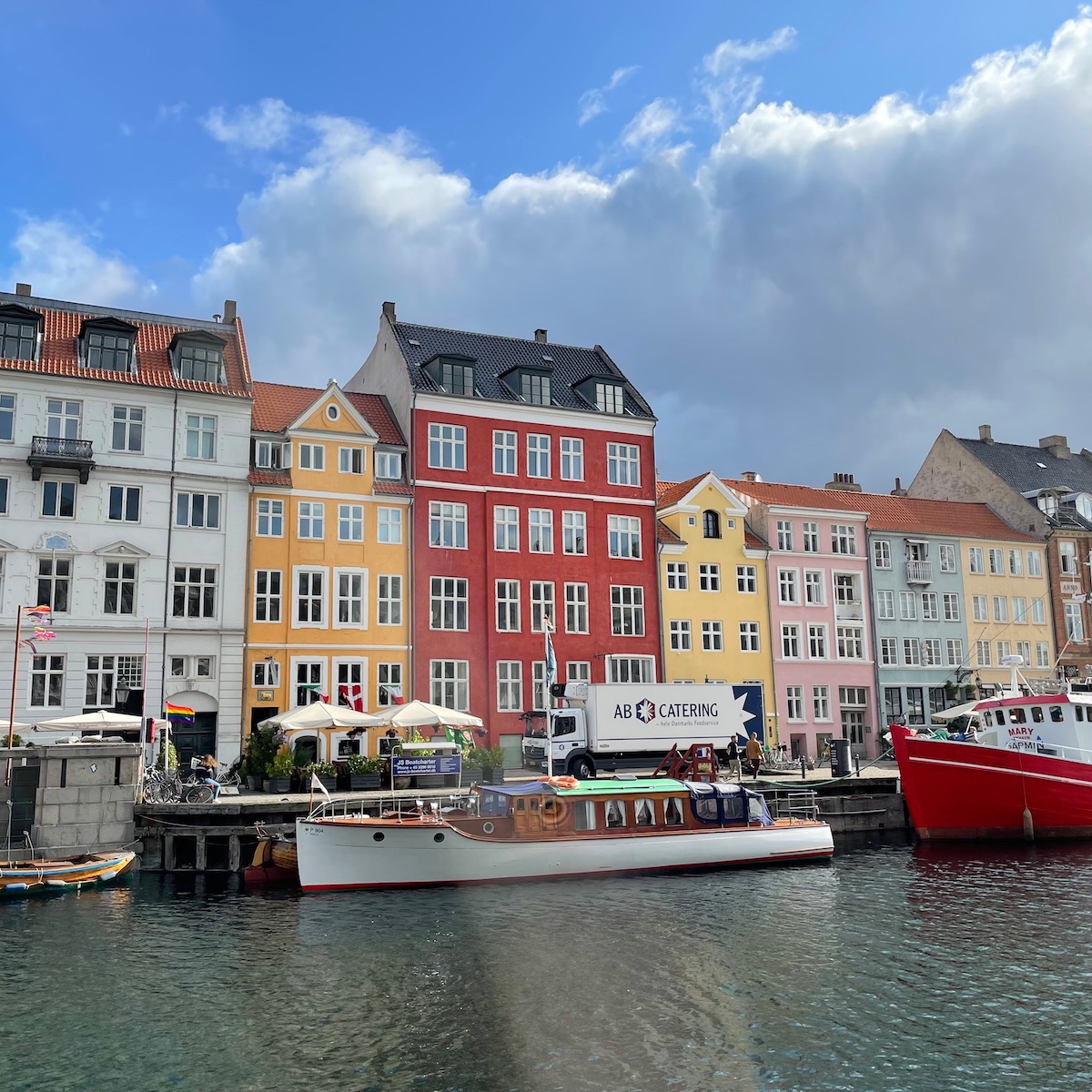 Colorful houses and boats in a canal