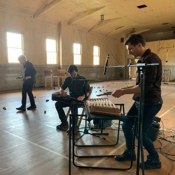 Ellen Fullman playing the Long String Instrument with the Living Earth Show.