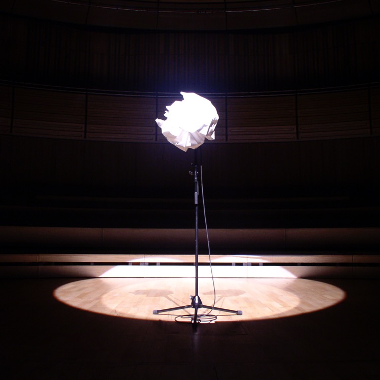 Takehisa Kosugi Microphone on a stand covered in a ball of paper.