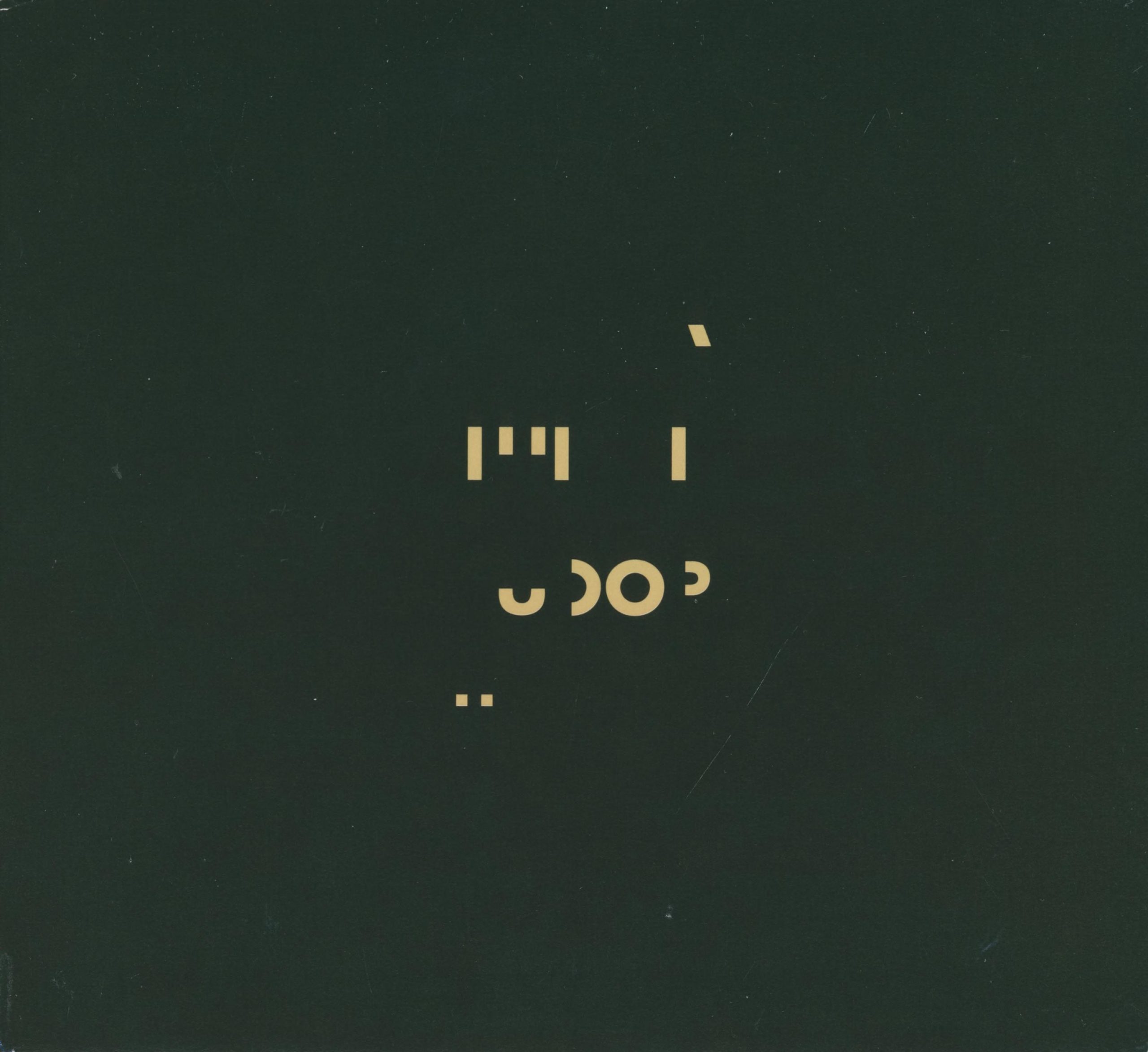 John Cage Variations II gold symbols on a dark gray background