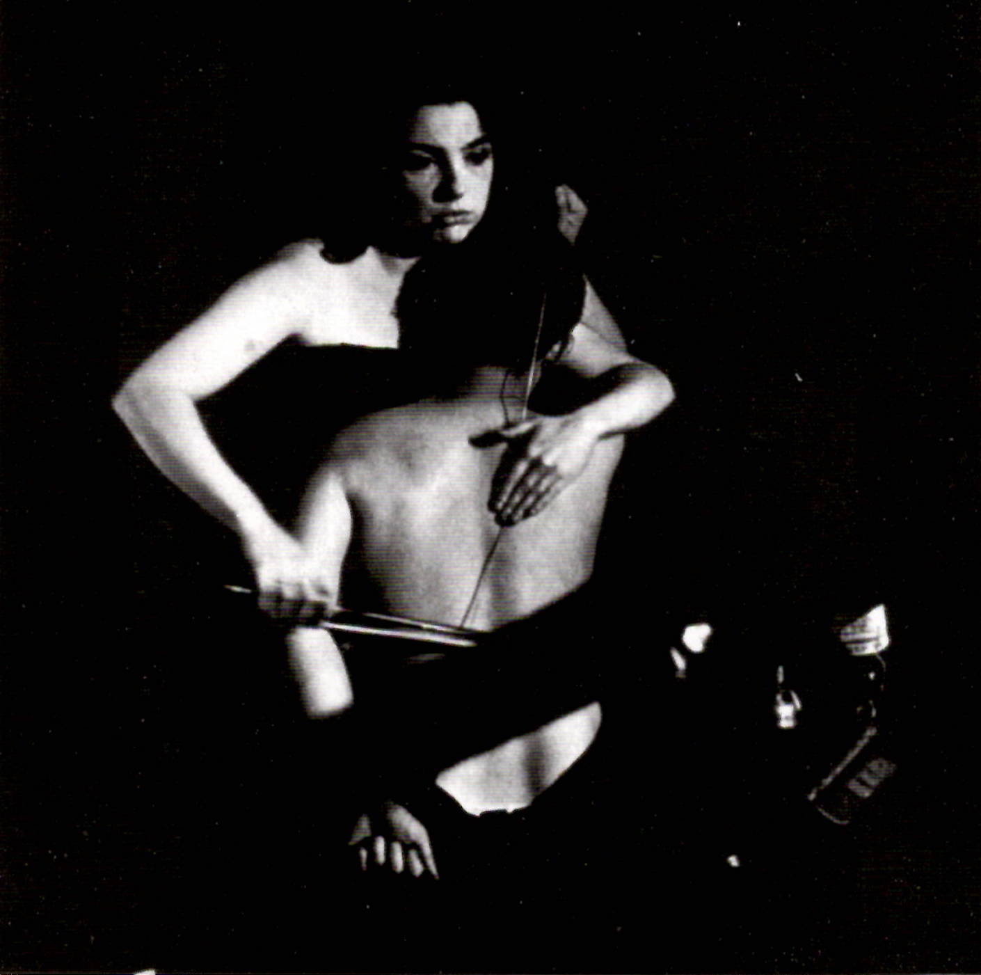 Charlotte Moorman Charlotte Moorman playing a human like a cello.