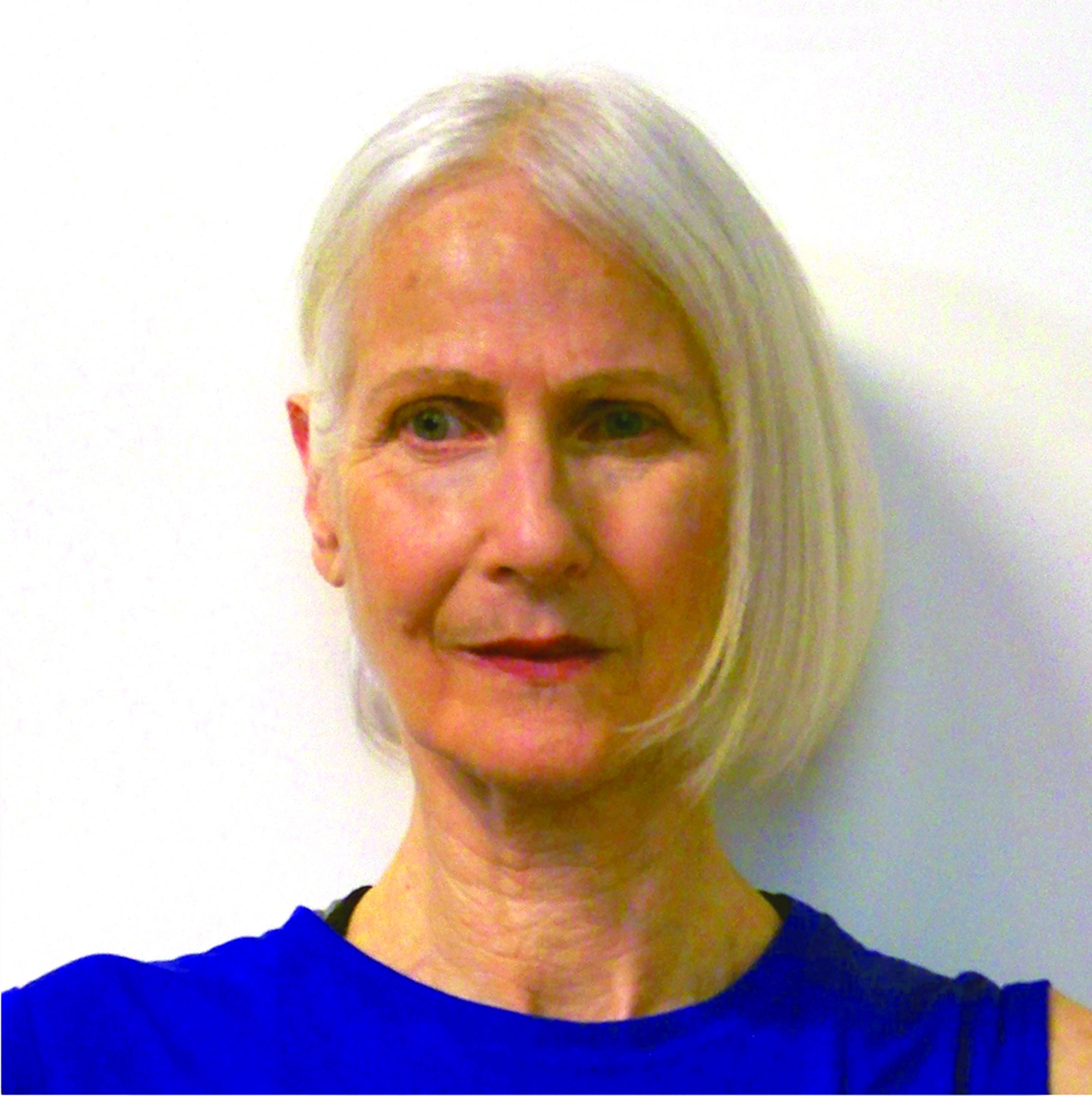 Margaret Fisher headshot with white background