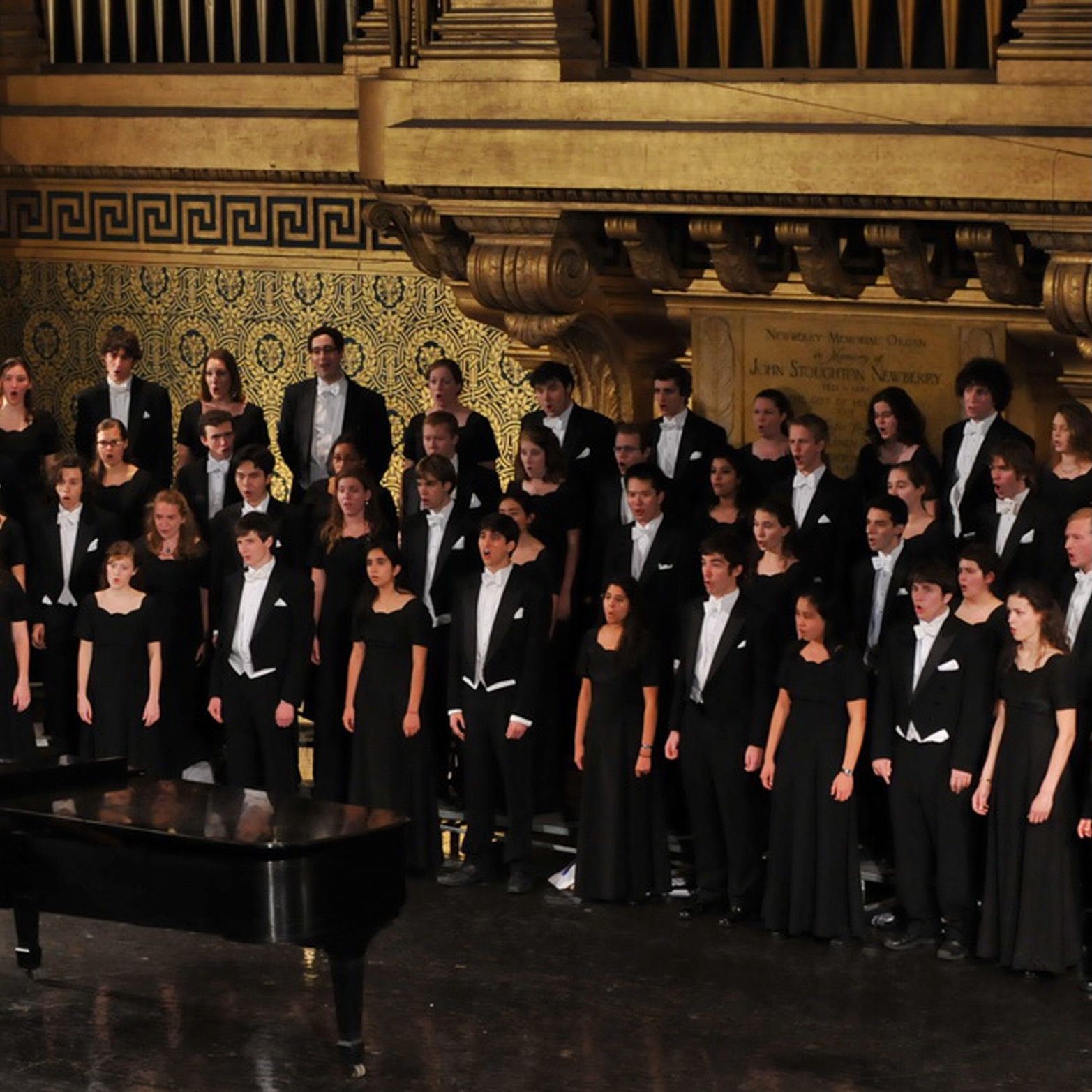Yale Glee Club A choir singing in a concert hall.