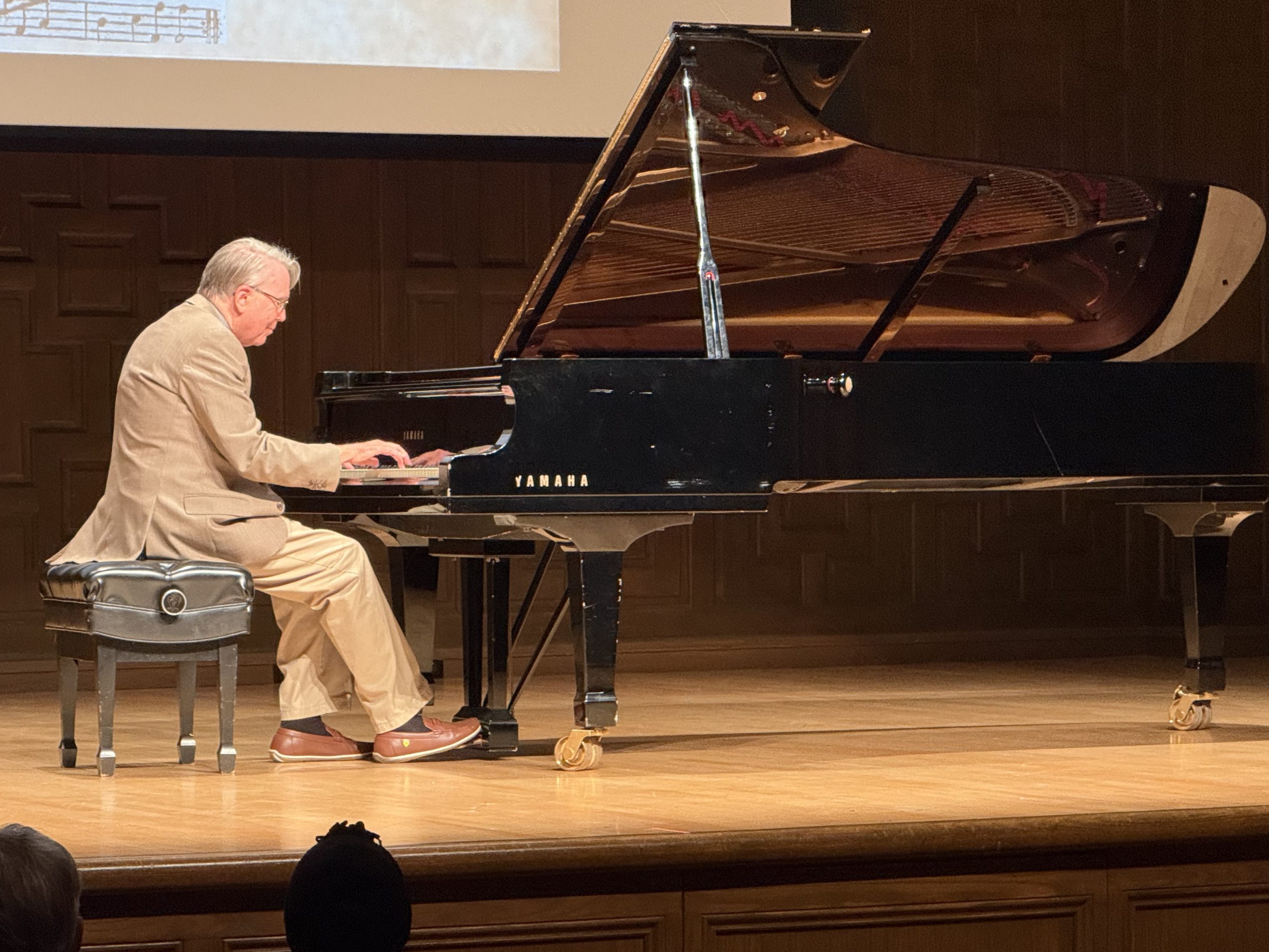 A man playing a piano