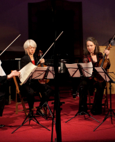 OM String Quartet turning pages