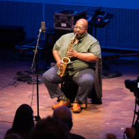 Darius Jones playing saxophone.