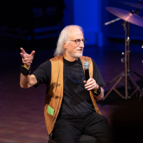 Larry Ochs speaking during a panel discussion