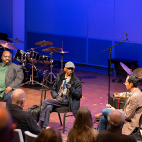Darius Jones, Roscoe Mitchell, and Nate Chinen in a panel discussion.