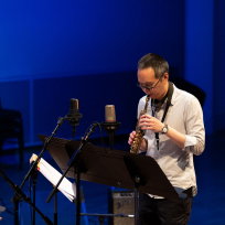 James Fei playing saxophone.