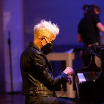 Myra Melford playing piano.