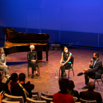 Zeena Parkins, Myra Melford, Jen Shyu, and Nate Chinen speaking on a panel.
